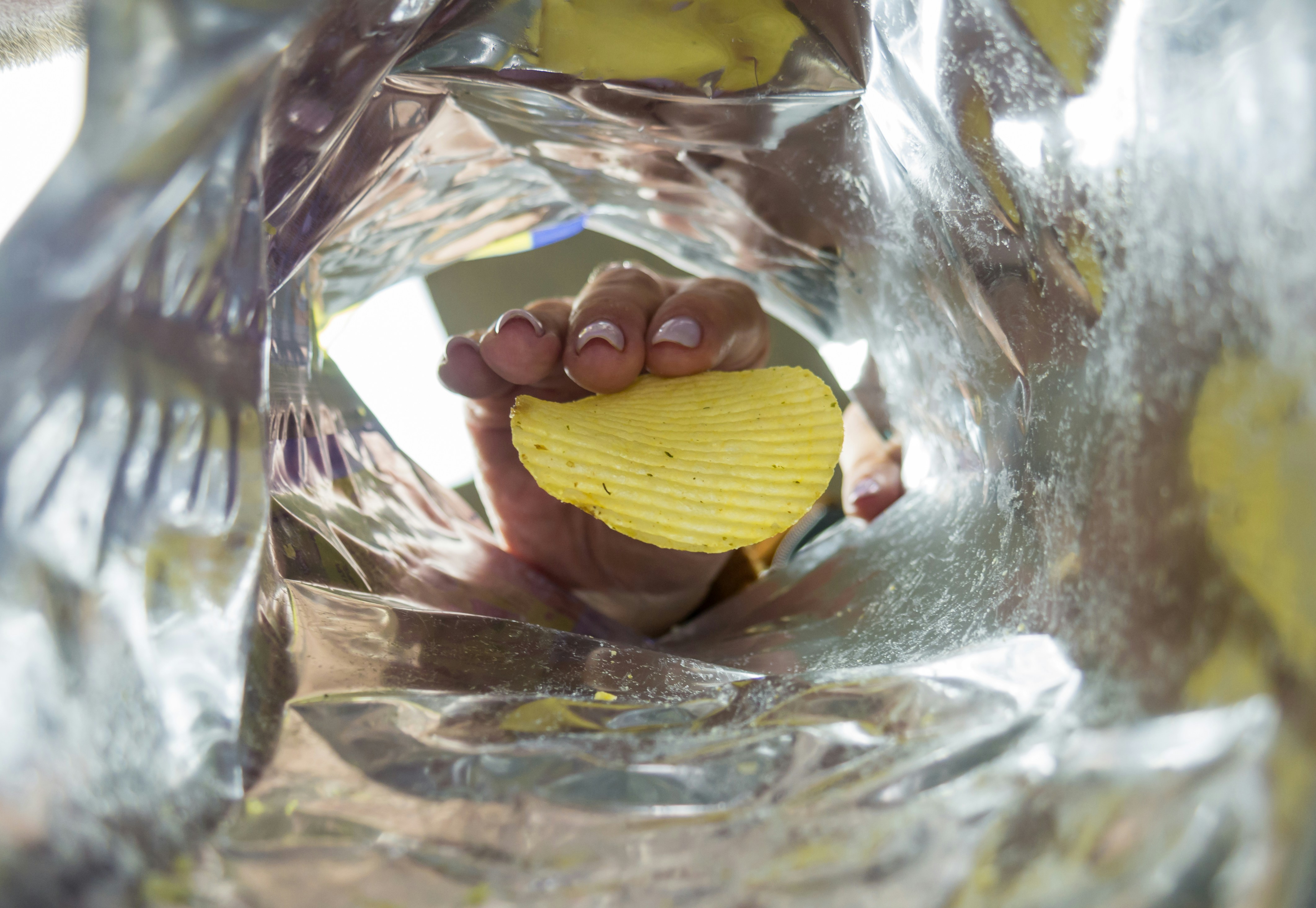 Woman takes chips from the package, photo from the package. Subscribe my channel: https://www.youtube.com/@earthzoom | Donation: https://fantalks.io/r/bermixstudio - any amount appreciated 🤘 Thanks friend!